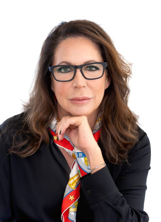 Professional headshot of Loran Arvizu, luxury real estate specialist in La Quinta and Greater Palm Springs.